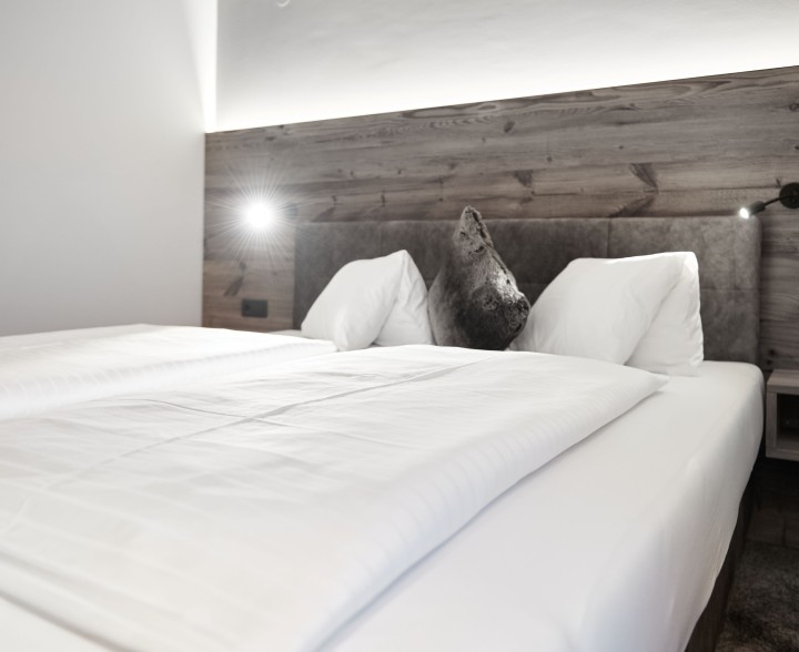 Gemütliche Betten in den Wieslbauer Appartements in Flachau 